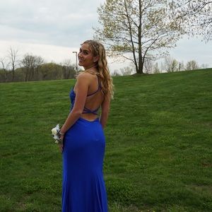 Blue Prom Dress Size 6 but fits a Size 2. Worn once. Message for more pics